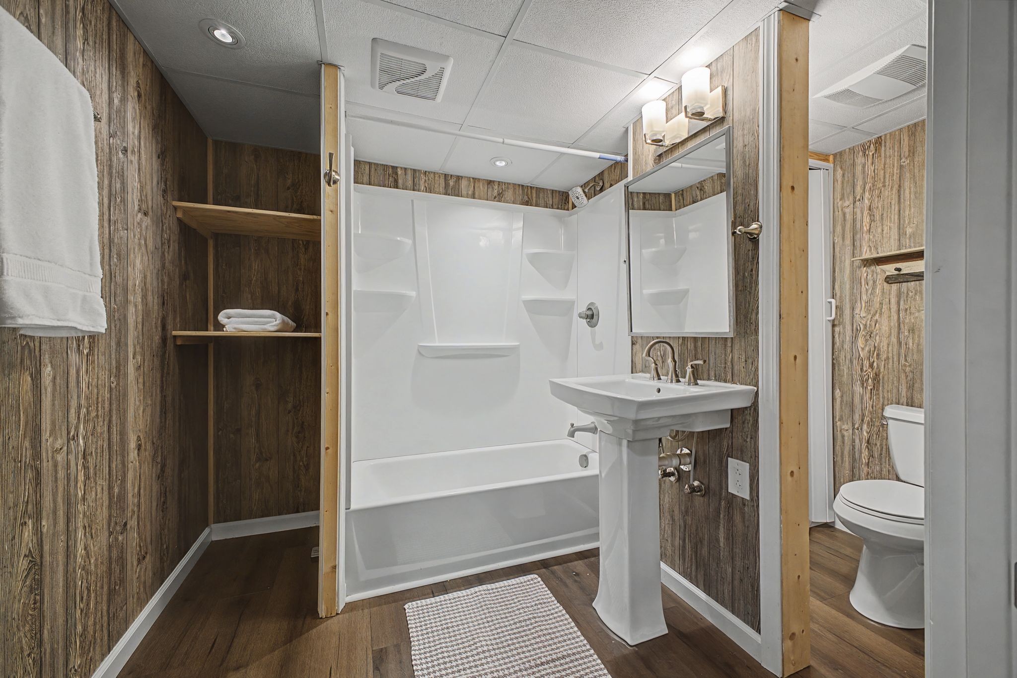 1081 Ridgecrest Drive Kingston Springs, TN 37082 - Photo 32 of 49 a bathroom with a sink and a mirror