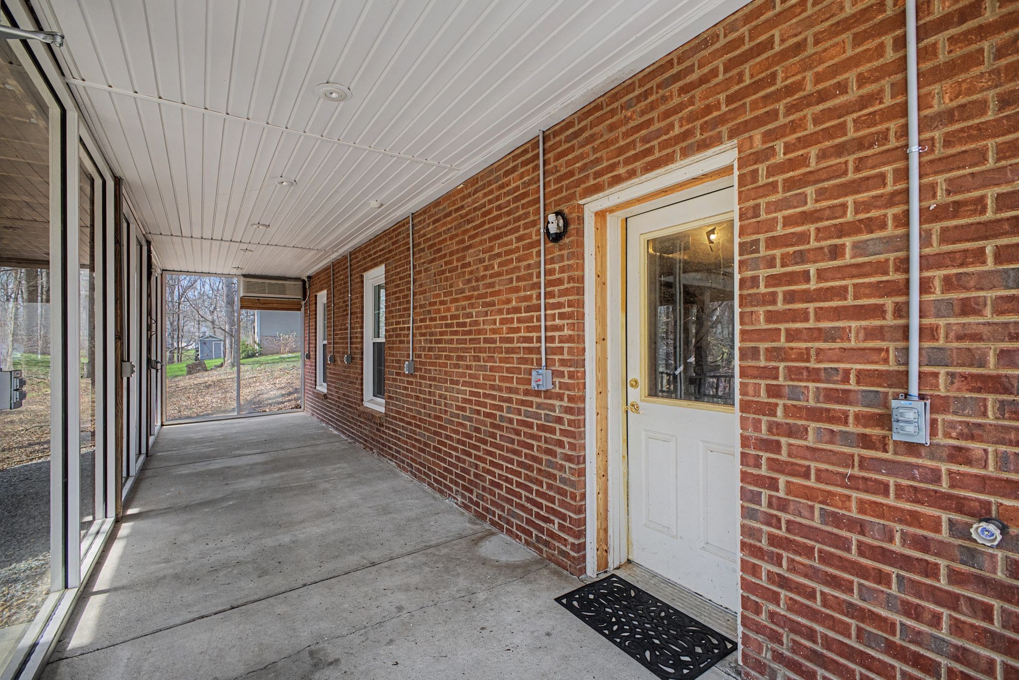 1081 Ridgecrest Drive Kingston Springs, TN 37082 - Photo 41 of 49 a view of a brick house with a large window