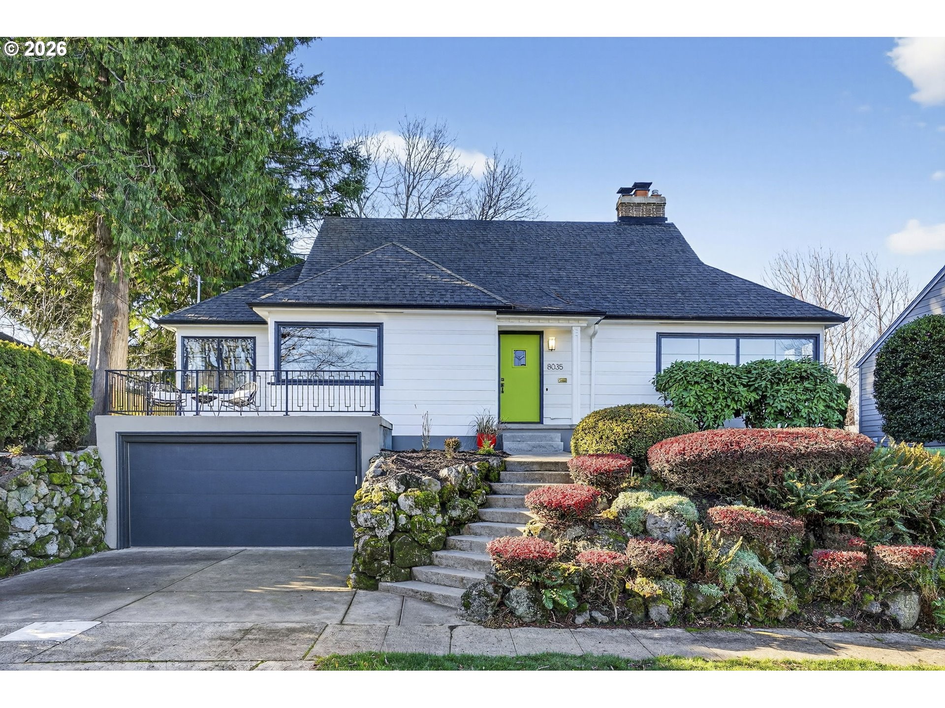 8035 Southwest 8th Avenue Portland, OR 97219 - Photo 1 of 42 a front view of house with yard and seating space