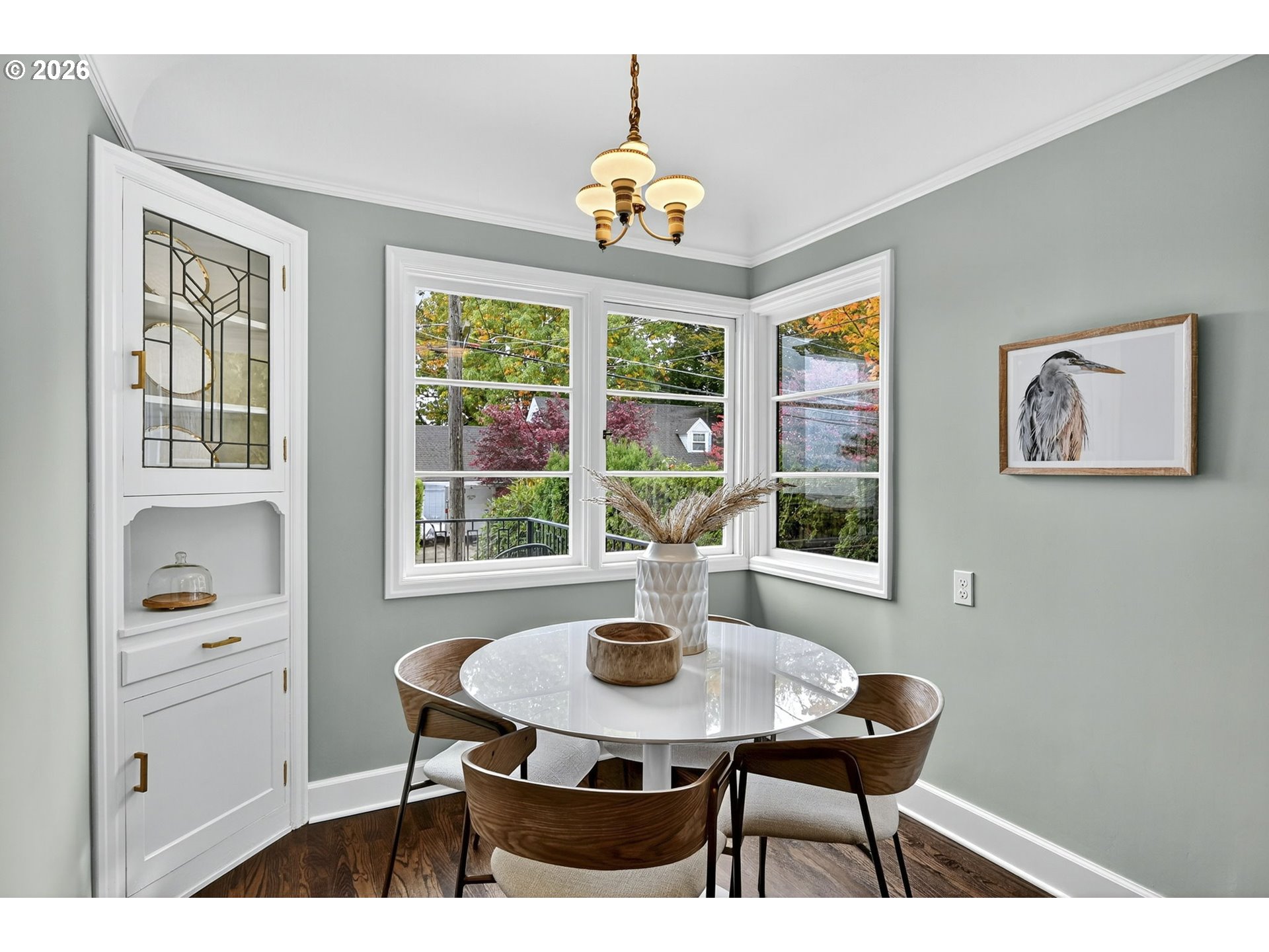 8035 Southwest 8th Avenue Portland, OR 97219 - Photo 13 of 42 a view of a dining room with furniture window and outside view