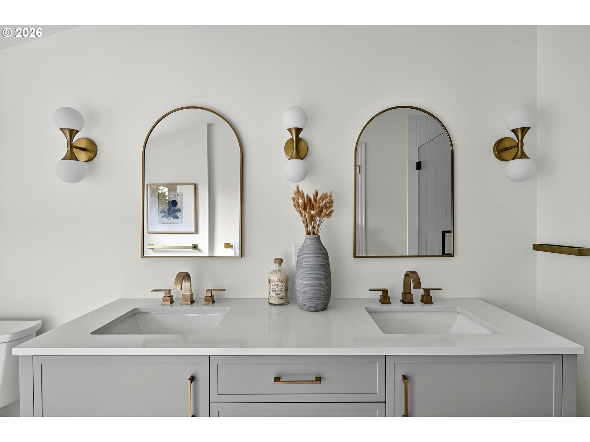 8035 Southwest 8th Avenue Portland, OR 97219 - Photo 27 of 42 a bathroom with a sink and a mirror