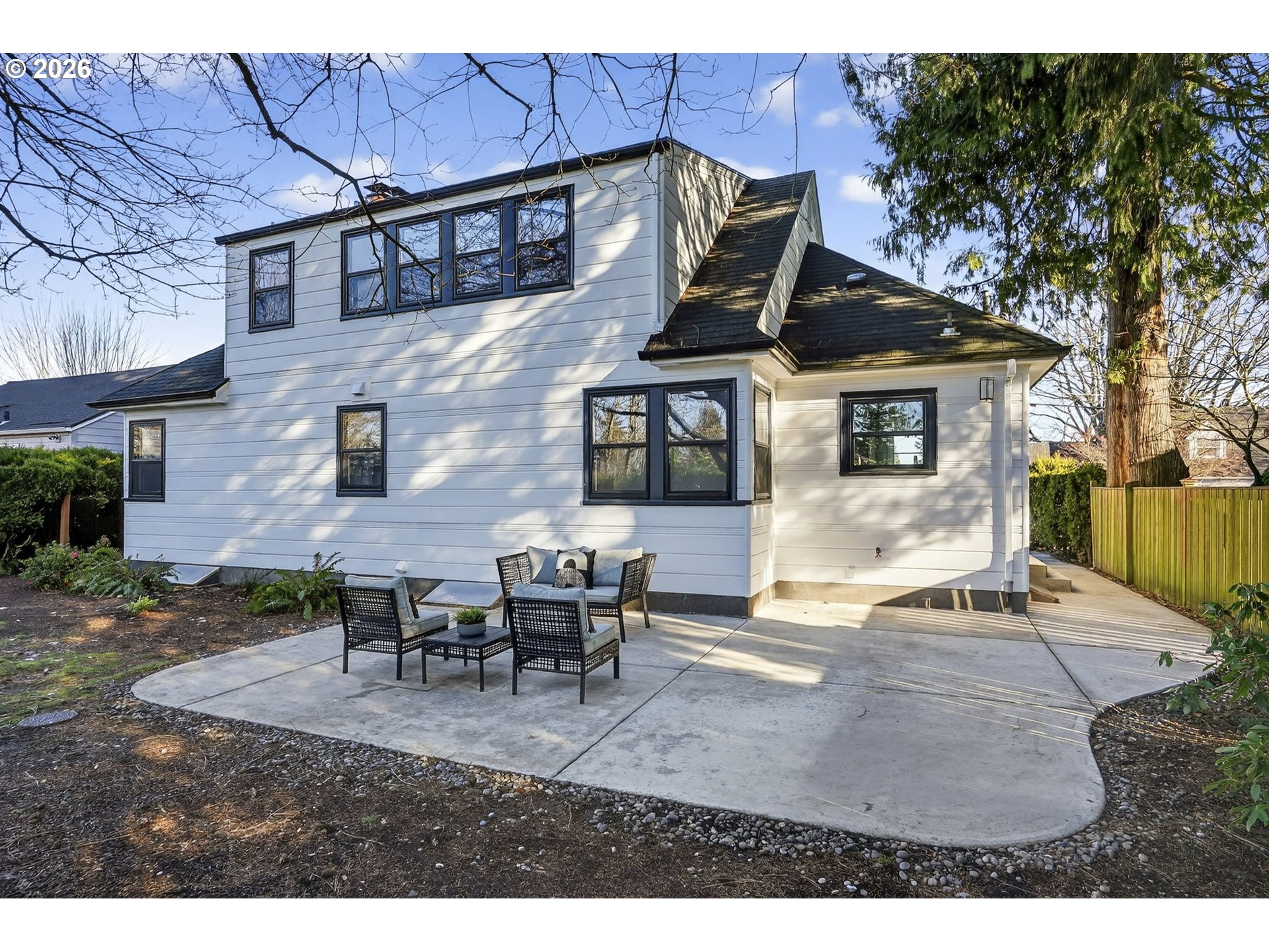 8035 Southwest 8th Avenue Portland, OR 97219 - Photo 36 of 42 a view of a house with backyard and sitting area