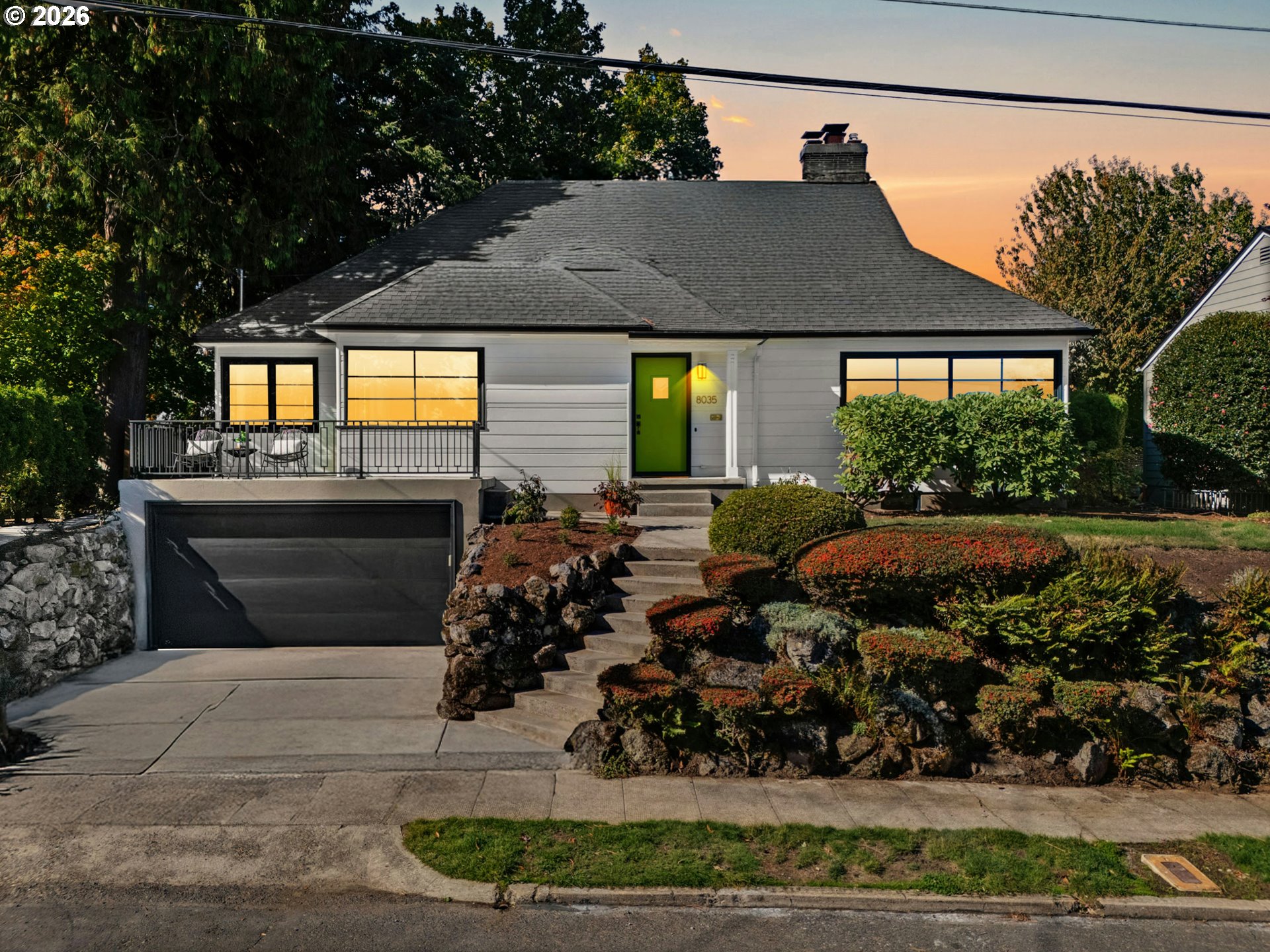8035 Southwest 8th Avenue Portland, OR 97219 - Photo 42 of 42 a front view of a house with garden