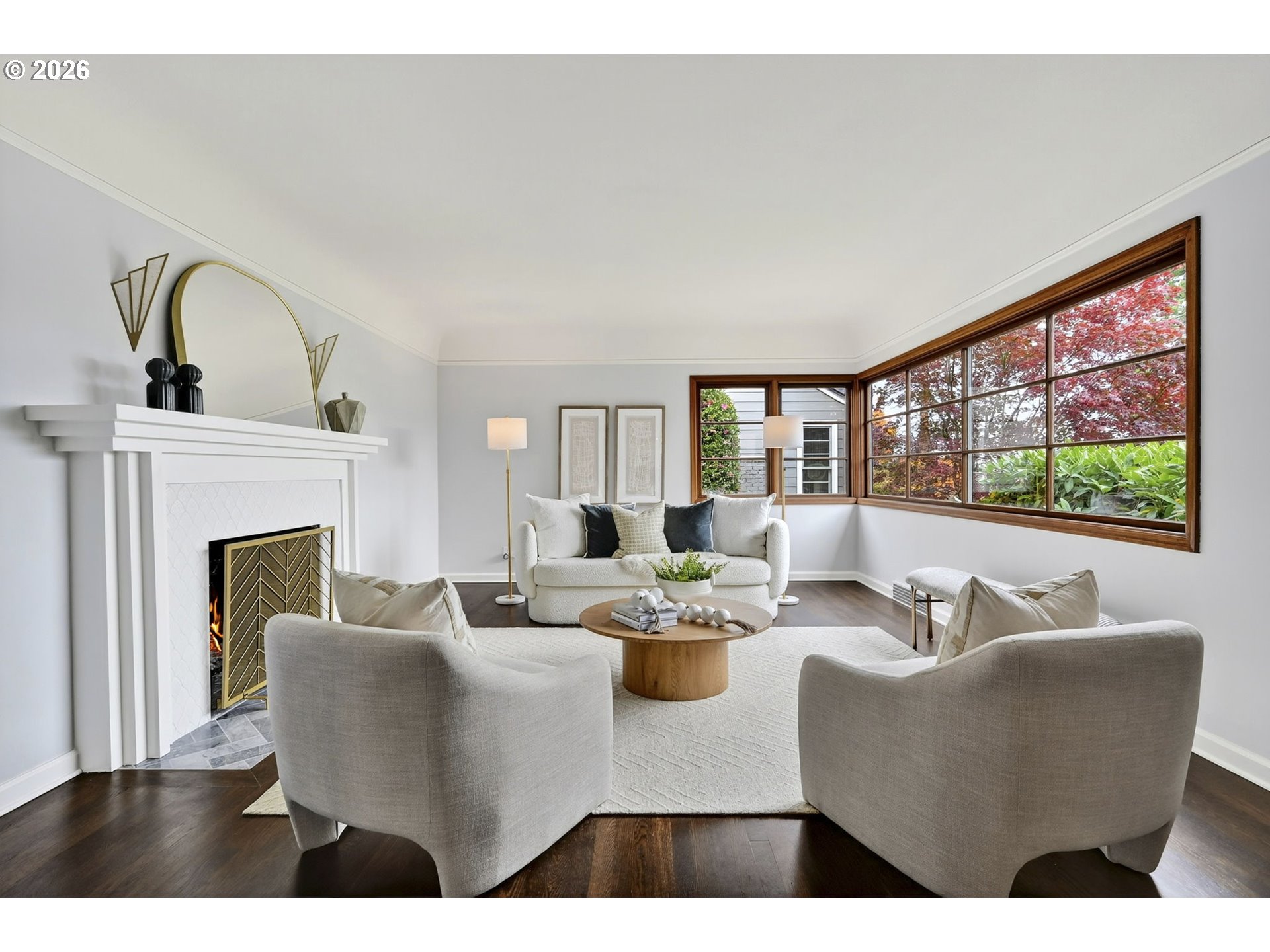 8035 Southwest 8th Avenue Portland, OR 97219 - Photo 6 of 42 a living room with fireplace furniture and a large window