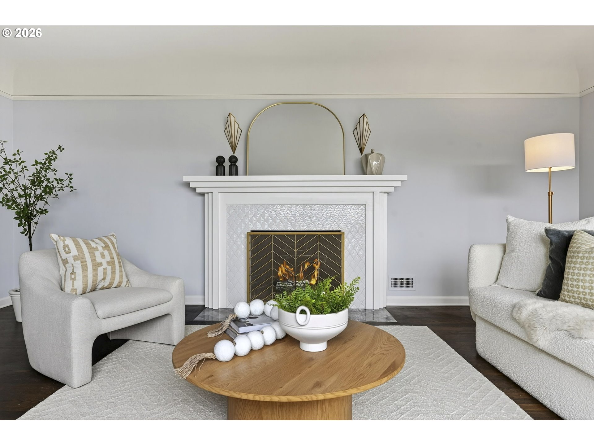 8035 Southwest 8th Avenue Portland, OR 97219 - Photo 7 of 42 a living room with furniture a fireplace and a table