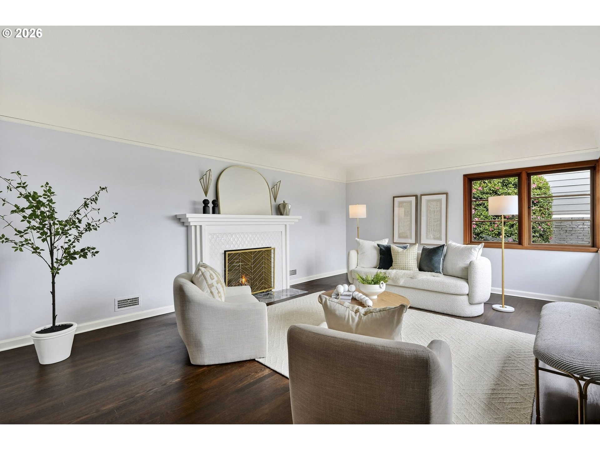 8035 Southwest 8th Avenue Portland, OR 97219 - Photo 8 of 42 a living room with furniture a potted plant and a fireplace