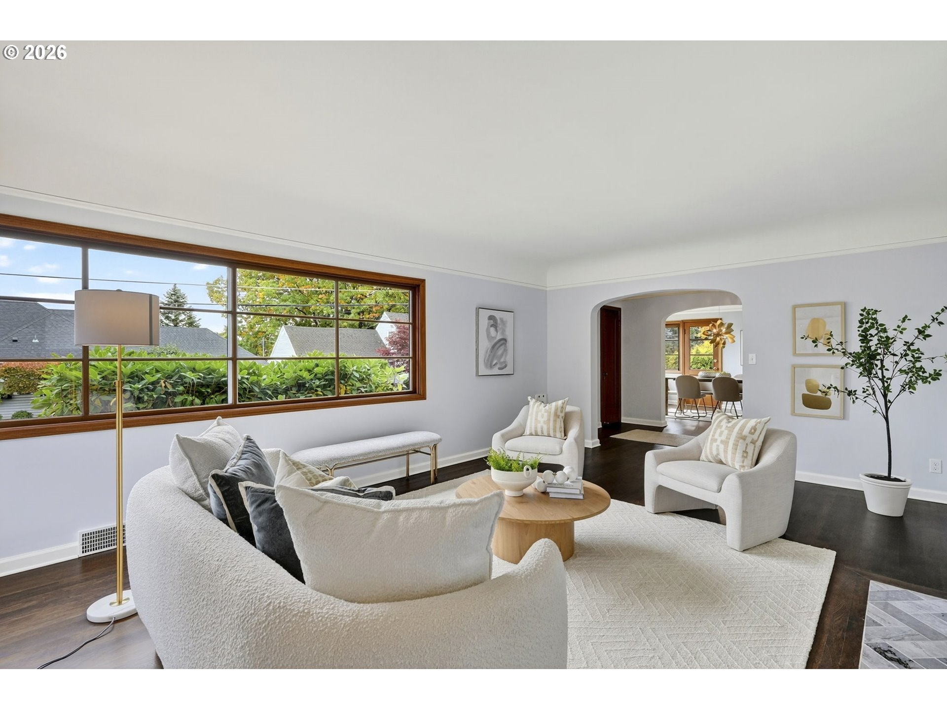 8035 Southwest 8th Avenue Portland, OR 97219 - Photo 9 of 42 a living room with furniture and a large window