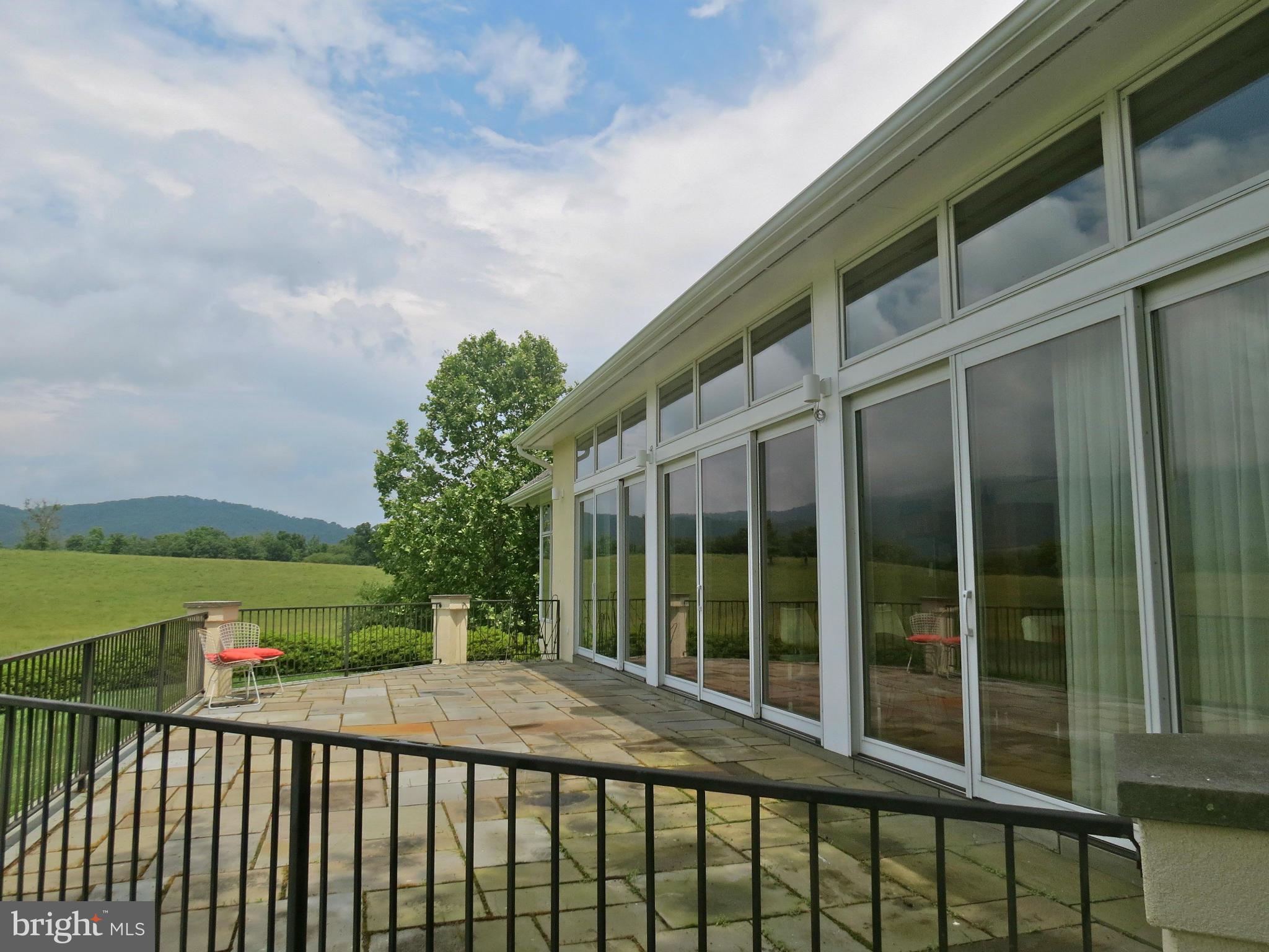 32 Harris Hollow Road Washington, VA 22747 - Photo 5 of 24 Slate patio outside the windows