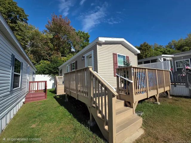 a view of backyard with deck and deck