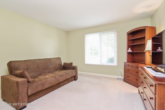 20 Lochbrook Lane Inverness, IL 60010 - Photo 16 of 27 a living room with furniture and a window
