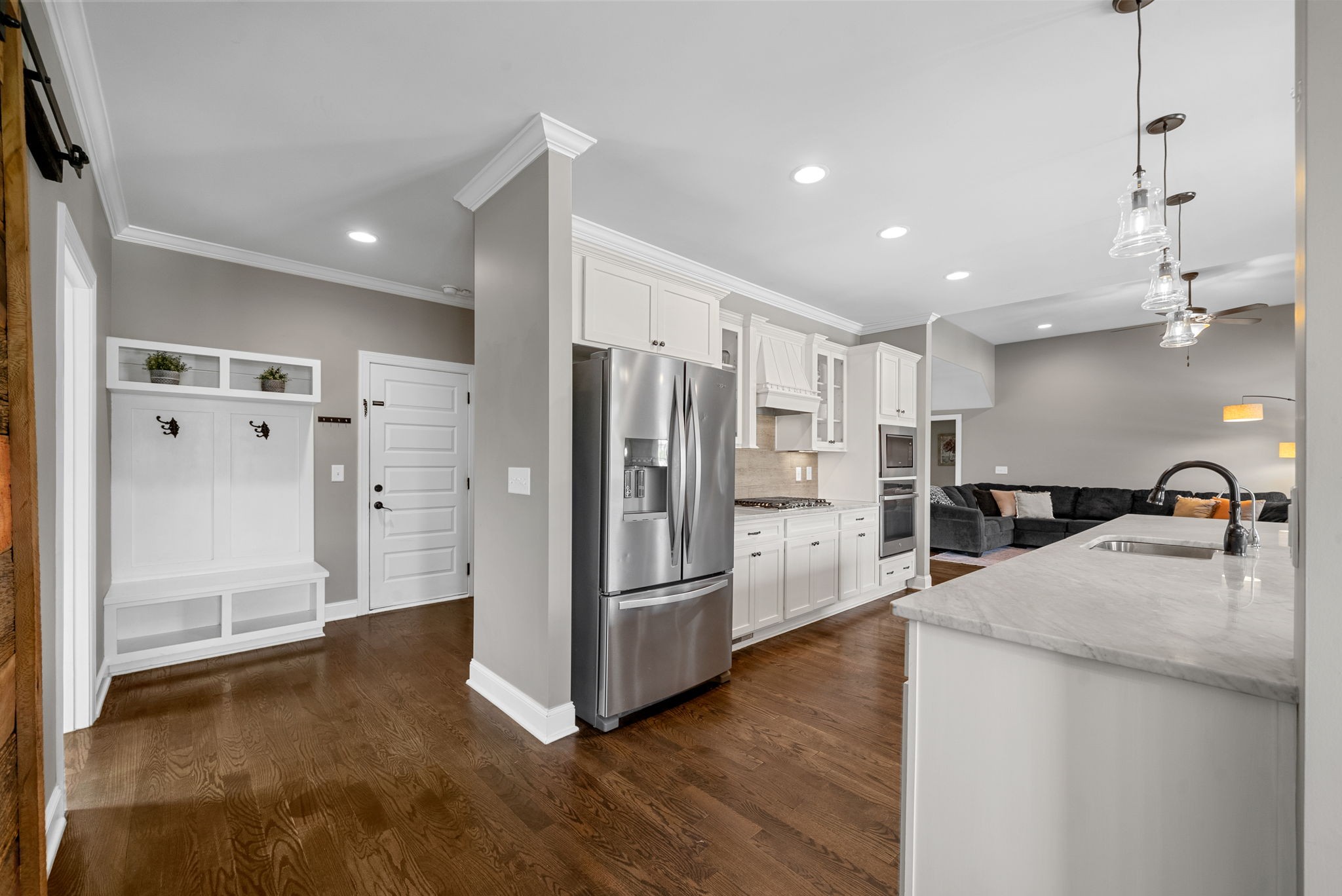 129 Springfield Drive Lebanon, TN 37087 - Photo 18 of 47 a kitchen with granite countertop a refrigerator and a sink