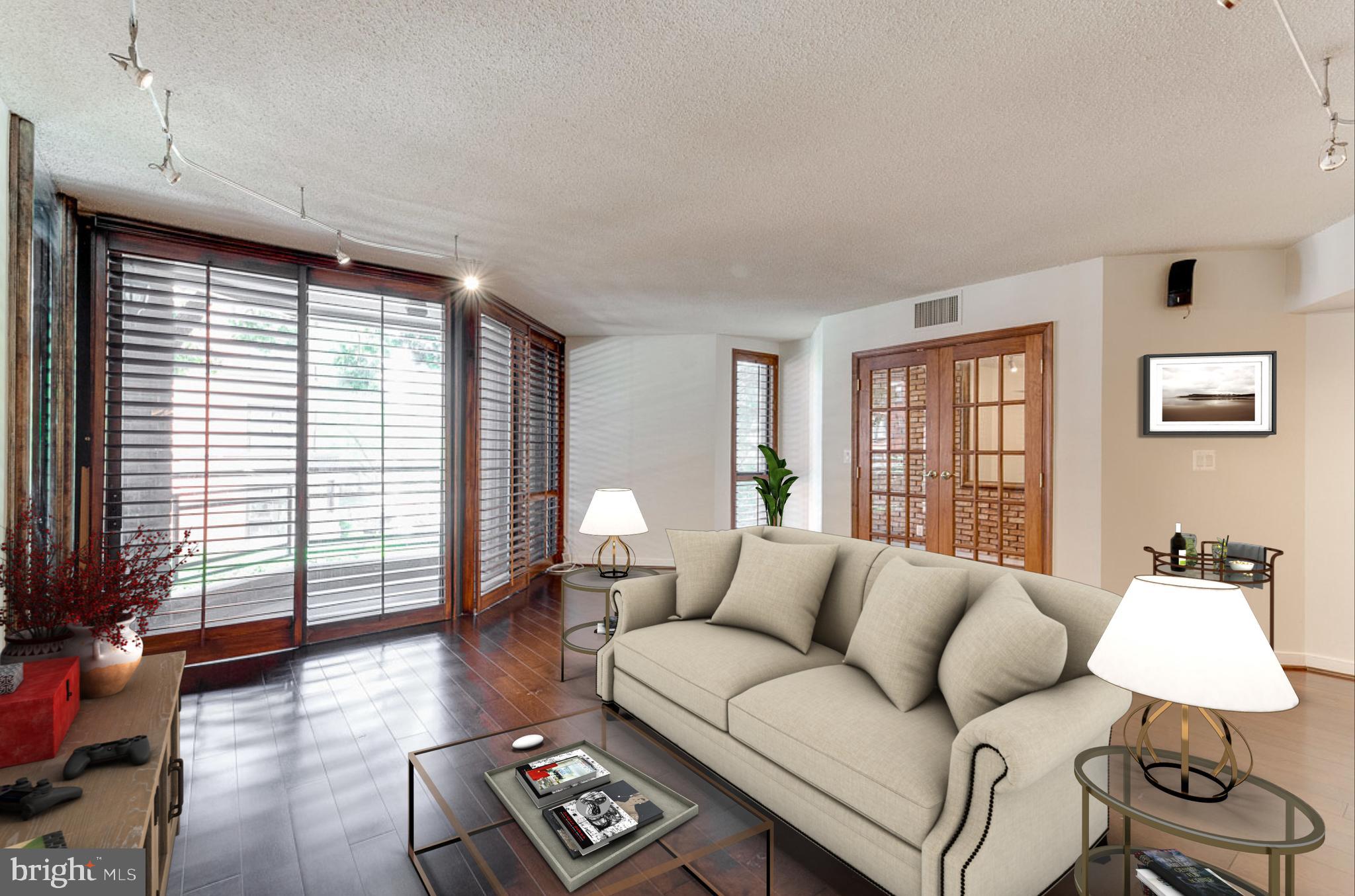 1099 22nd Street Northwest, Unit 304 Washington, DC 20037 - Photo 12 of 44 Living Room virtually staged