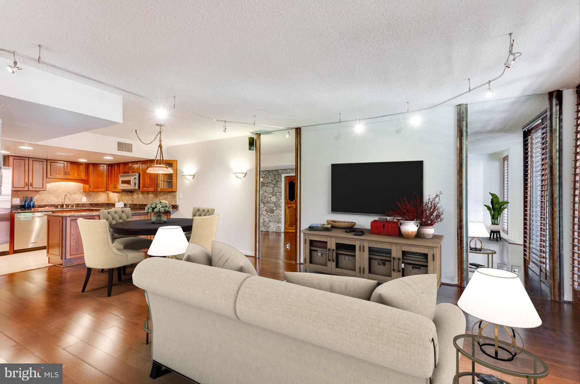 1099 22nd Street Northwest, Unit 304 Washington, DC 20037 - Photo 15 of 44 Living Room virtually staged