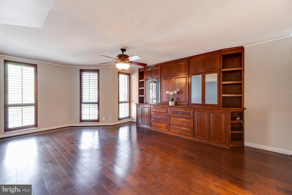 1099 22nd Street Northwest, Unit 304 Washington, DC 20037 - Photo 23 of 44 Master bedroom with great built-ins for storage
