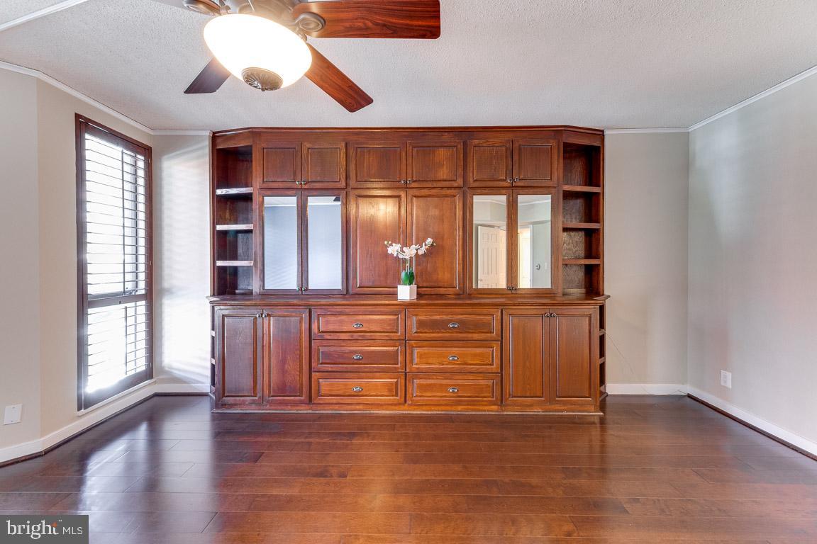 1099 22nd Street Northwest, Unit 304 Washington, DC 20037 - Photo 28 of 44 Master bedroom with great built-ins for storage