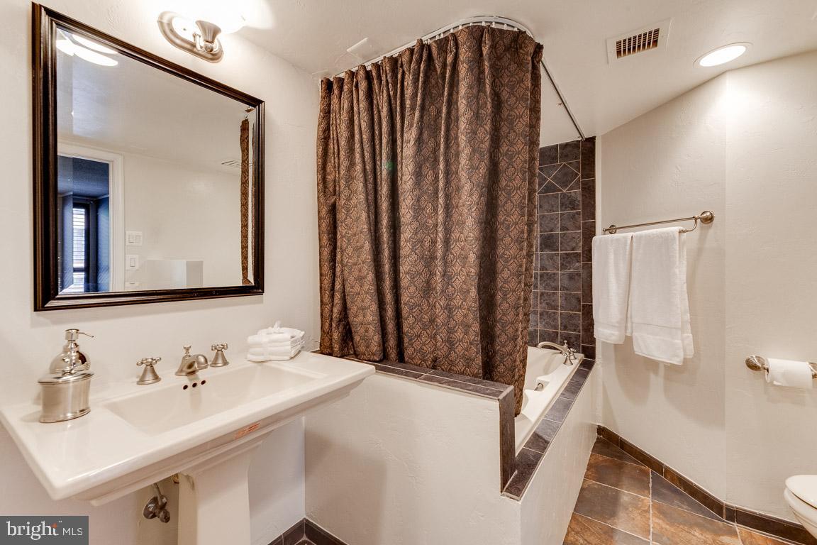 1099 22nd Street Northwest, Unit 304 Washington, DC 20037 - Photo 33 of 44 Master Bathroom