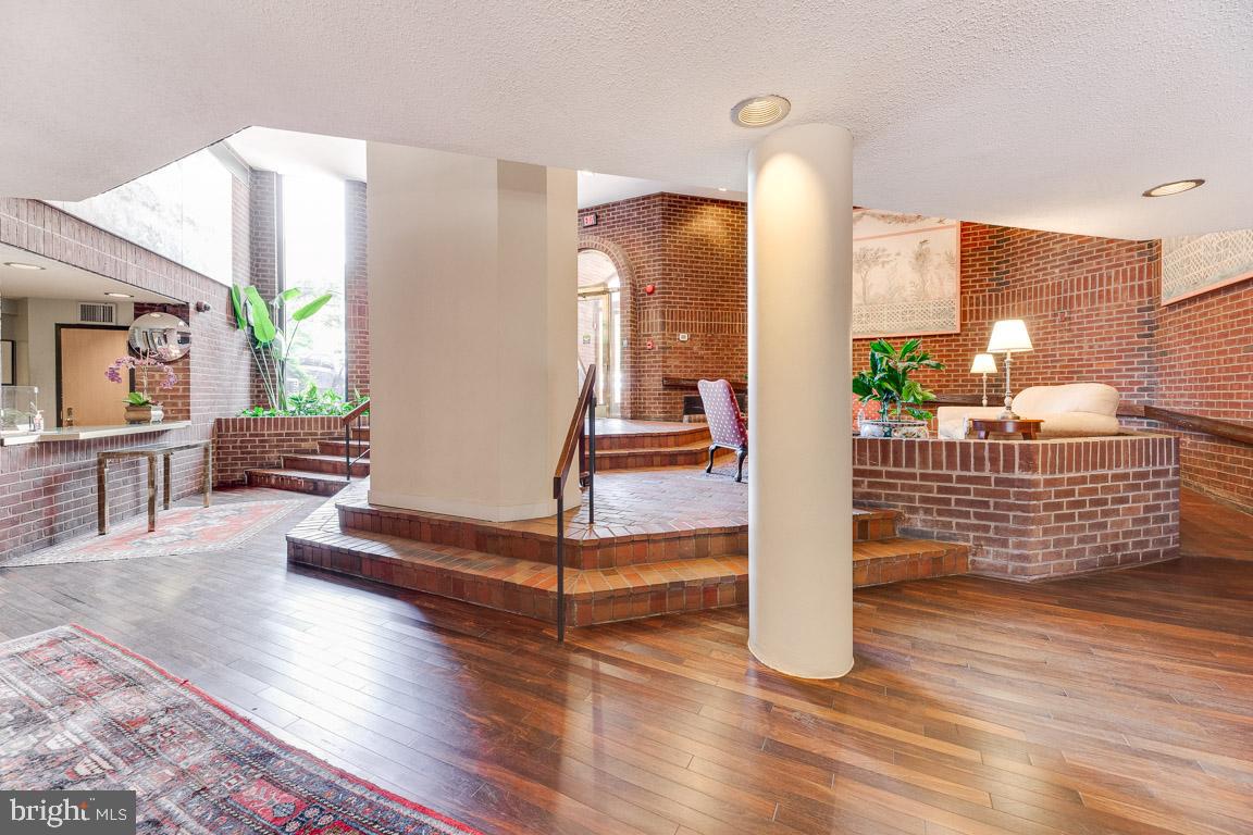 1099 22nd Street Northwest, Unit 304 Washington, DC 20037 - Photo 36 of 44 Lobby with Front Desk attendant 24 Hrs