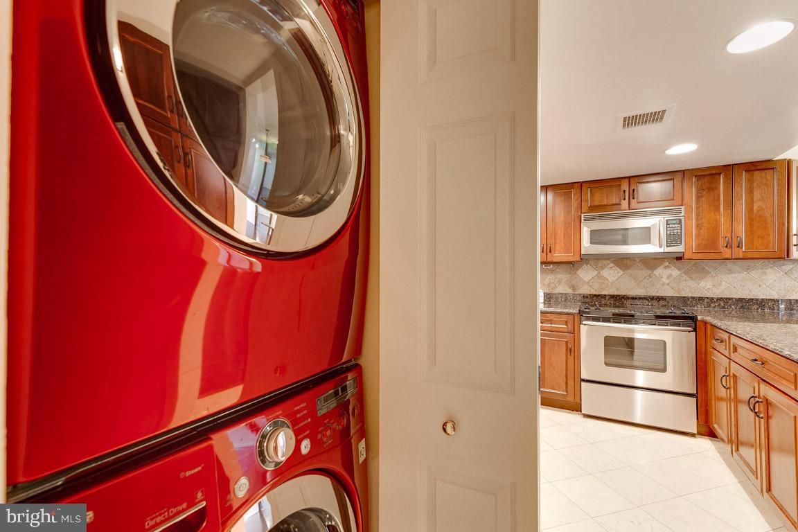 1099 22nd Street Northwest, Unit 304 Washington, DC 20037 - Photo 5 of 44 Stackable front loading W/D