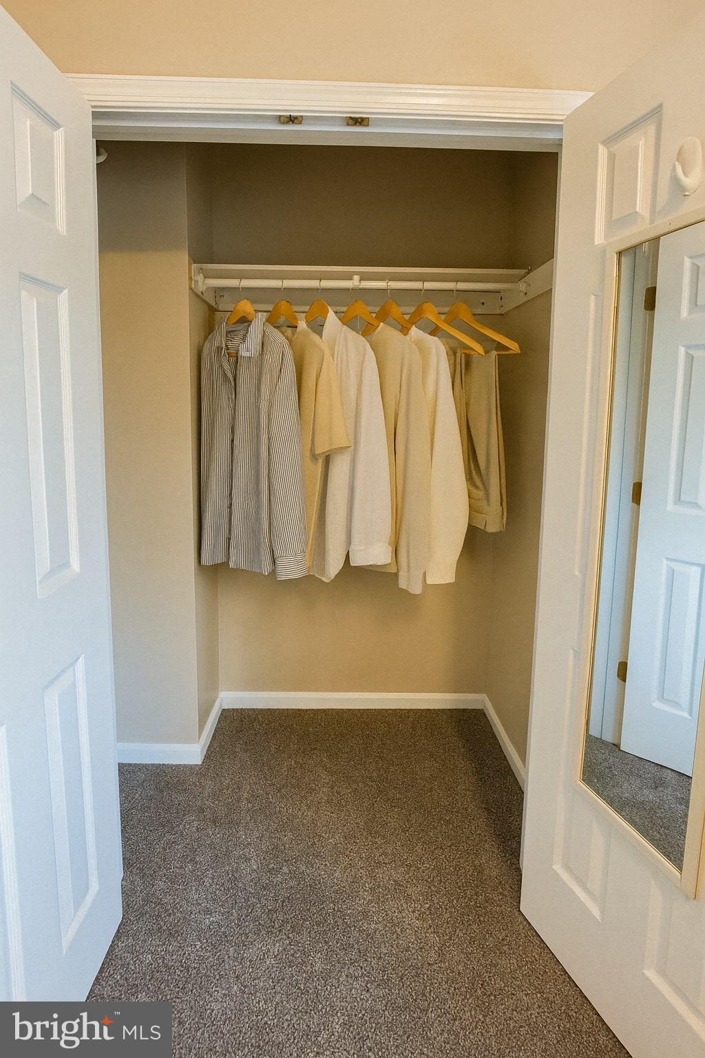 1913 Rosedale Street Northeast, Unit 1 Washington, DC 20002 - Photo 4 of 31 a view of walk in closet with clothes