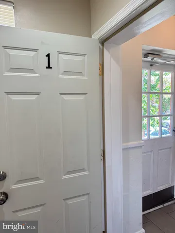 a view of walk in closet with window