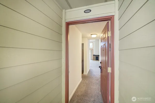 a view of a hallway to a house
