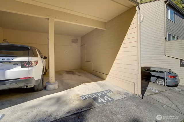 a view of street with parked cars
