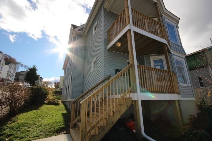 74 Green Hill Parkway Worcester, MA 01605 - Photo 12 of 42 a view of balcony with wooden floor and fence