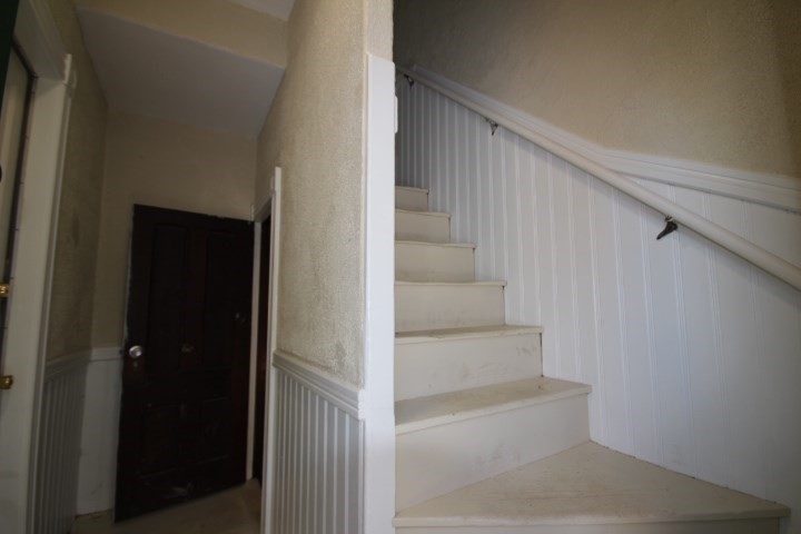 74 Green Hill Parkway Worcester, MA 01605 - Photo 36 of 42 a view of staircase with white walls and door