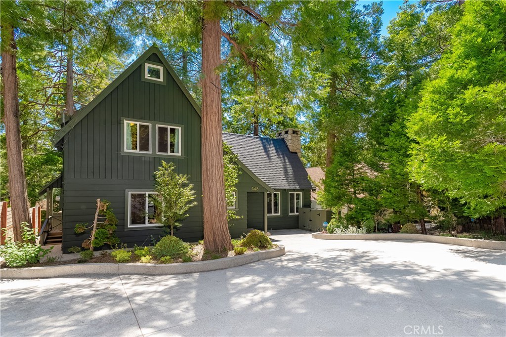 148 Bret Harte Road Lake Arrowhead, CA 92352 - Photo 1 of 23 a view of a house with a yard