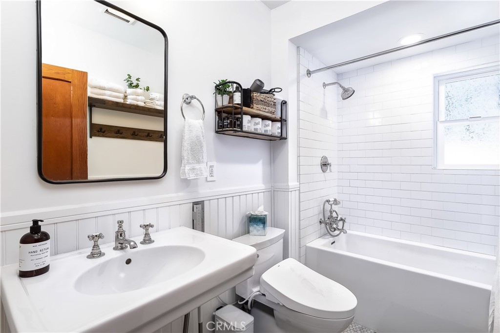 148 Bret Harte Road Lake Arrowhead, CA 92352 - Photo 14 of 23 a bathroom with a sink a toilet and shower