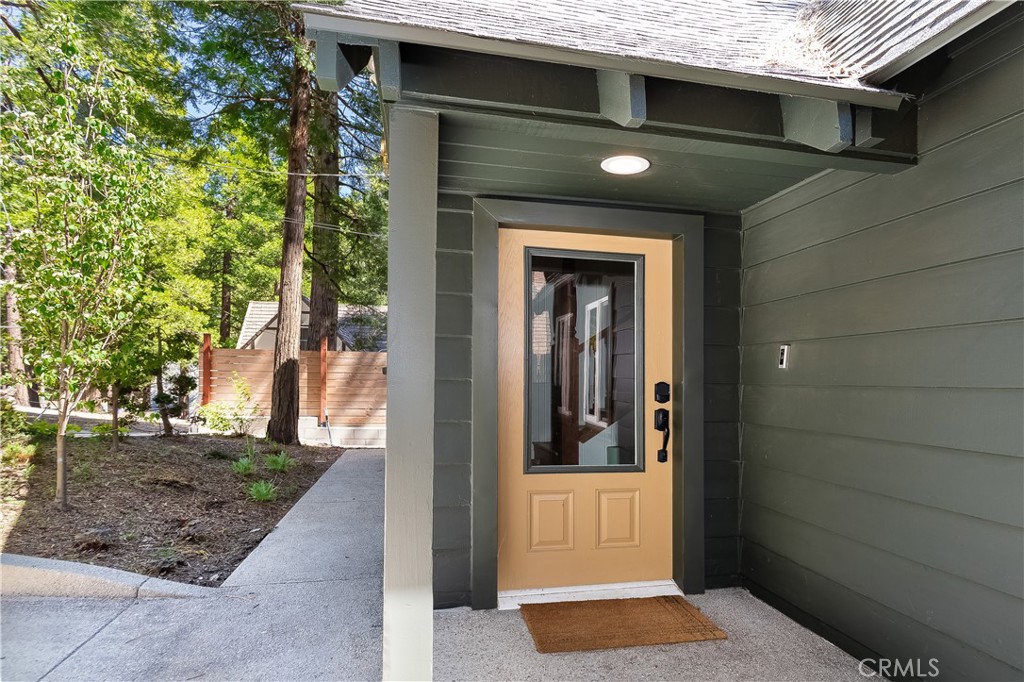 148 Bret Harte Road Lake Arrowhead, CA 92352 - Photo 2 of 23 a view of entryway of a house