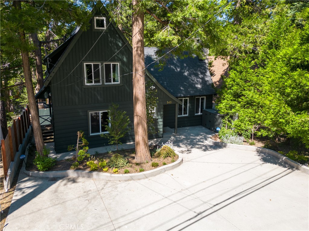 148 Bret Harte Road Lake Arrowhead, CA 92352 - Photo 23 of 23 a front view of a house with garden