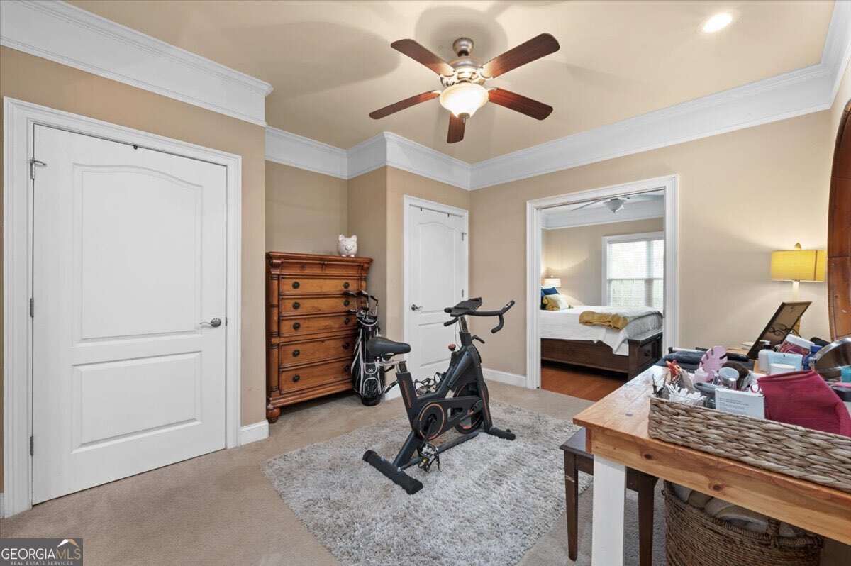 7272 Shellman Bluff Road Northeast, Unit 21 Townsend, GA 31331 - Photo 18 of 34 a view of a livingroom with furniture and a ceiling fan