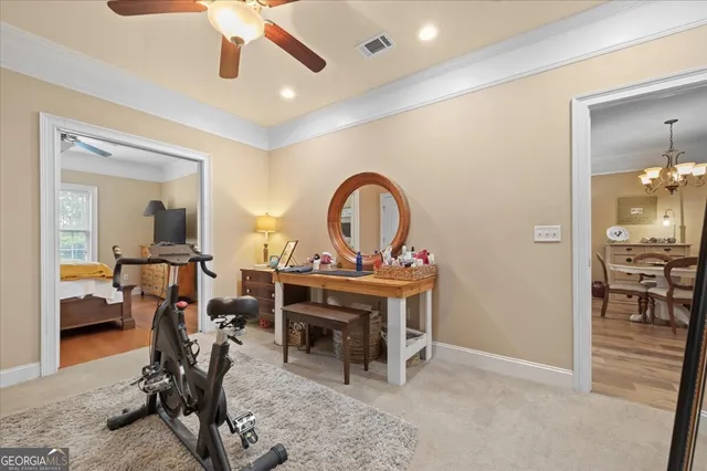 a view of a room with gym equipment