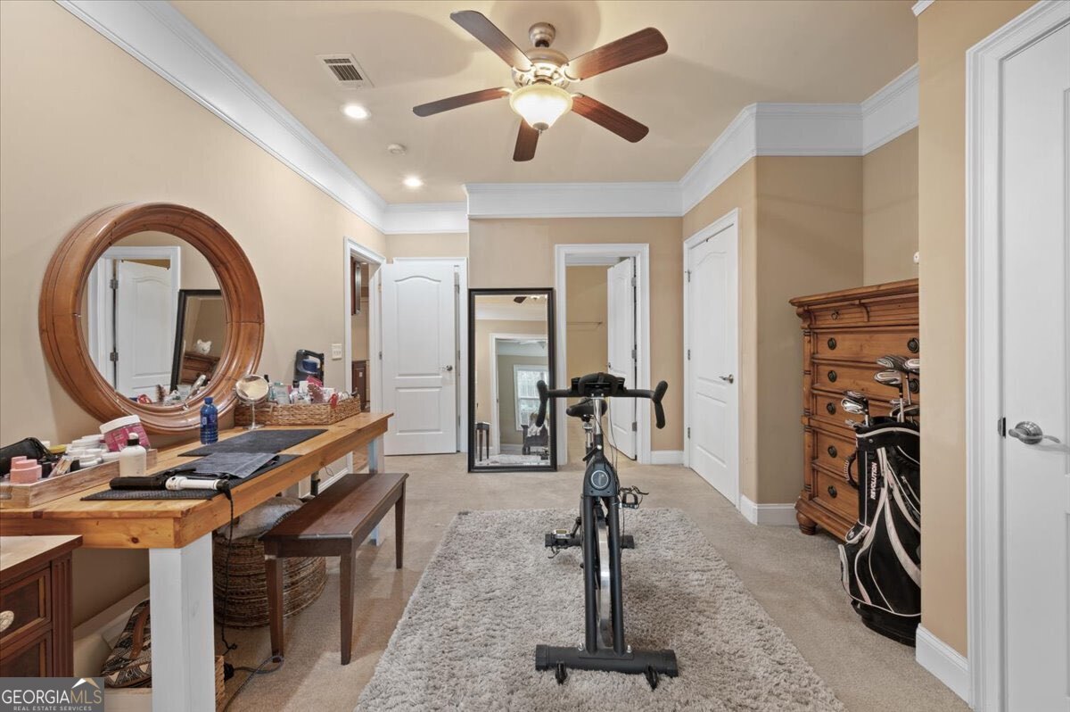 7272 Shellman Bluff Road Northeast, Unit 21 Townsend, GA 31331 - Photo 20 of 34 a view of a room with gym equipment