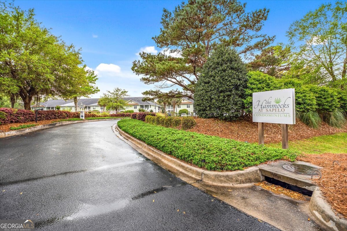 7272 Shellman Bluff Road Northeast, Unit 21 Townsend, GA 31331 - Photo 32 of 34 a view of a street with cars park