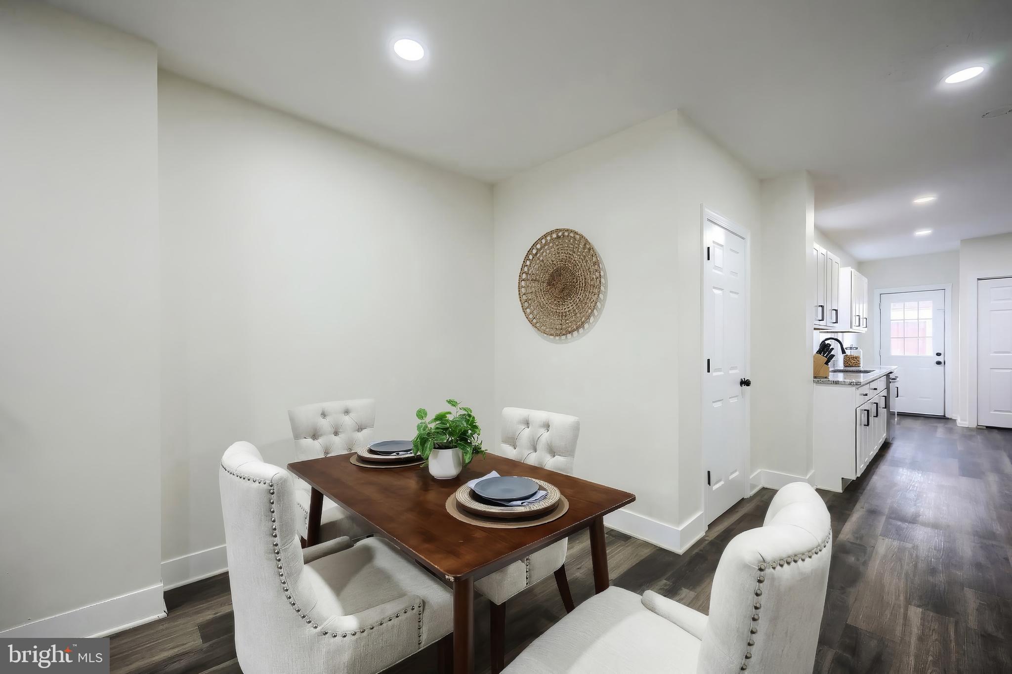 442 East Prospect Street York, PA 17403 - Photo 8 of 33 a view of a dining room with furniture and wooden floor