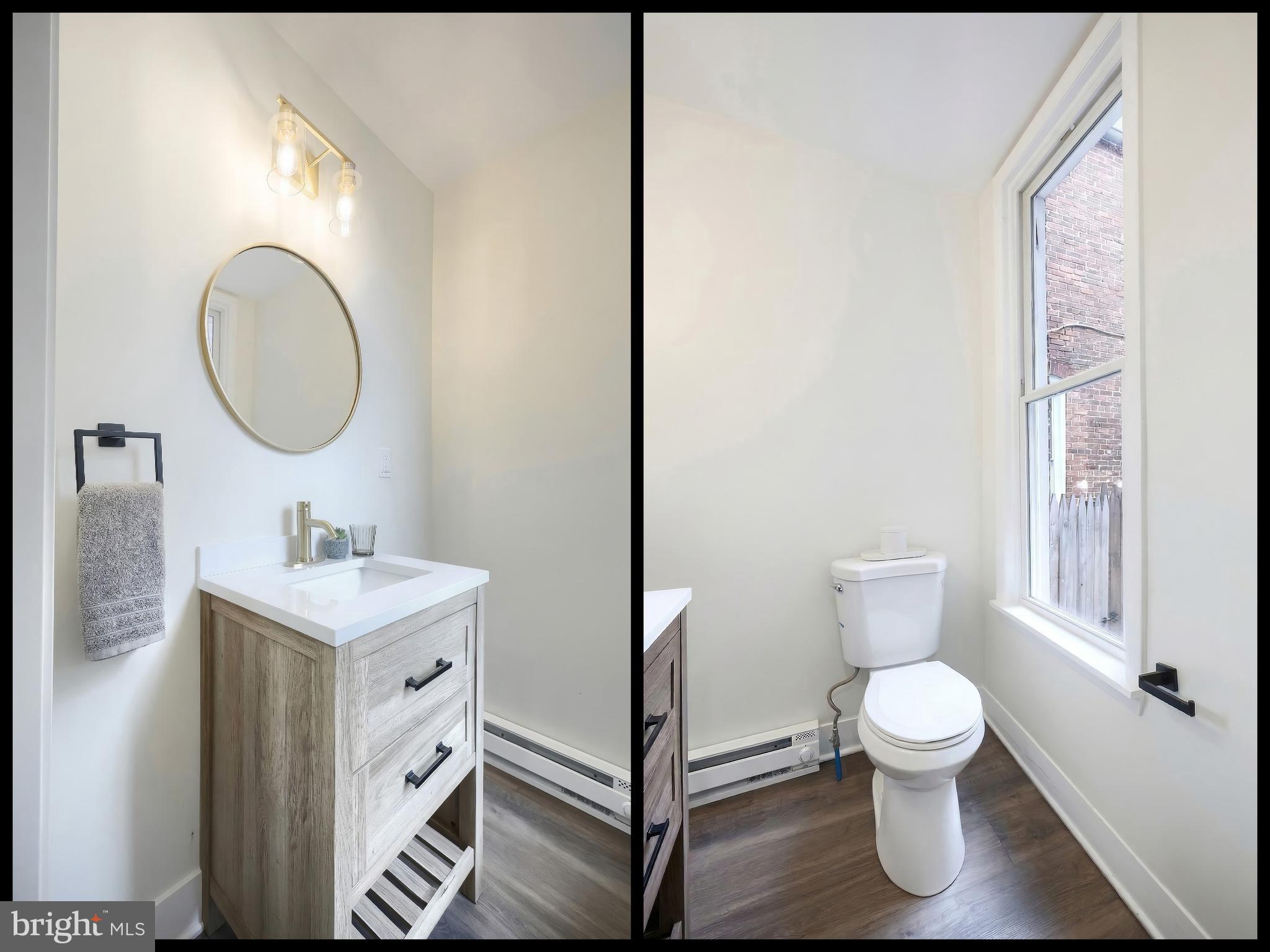 442 East Prospect Street York, PA 17403 - Photo 9 of 33 a bathroom with a toilet sink vanity and mirror