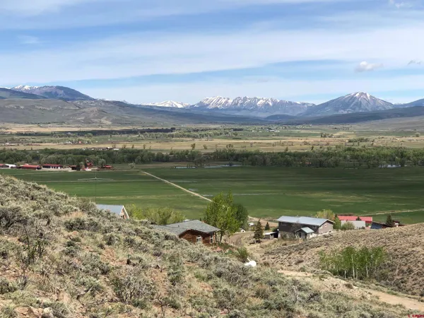 a view of a lake with a mountain