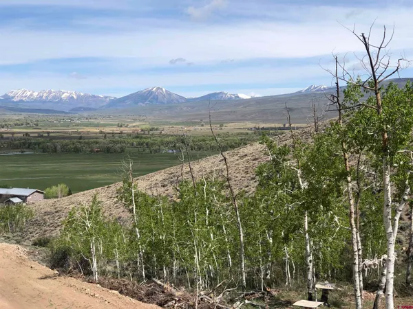 a view of a lake with a mountain in the background