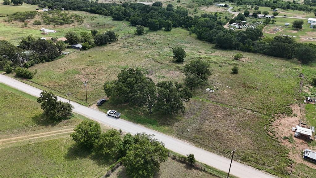 497 Big Sandy Road Newcastle, TX 76372 - Photo 21 of 22 Expansive undeveloped land featuring a combination of grassy fields and scattered mature trees
