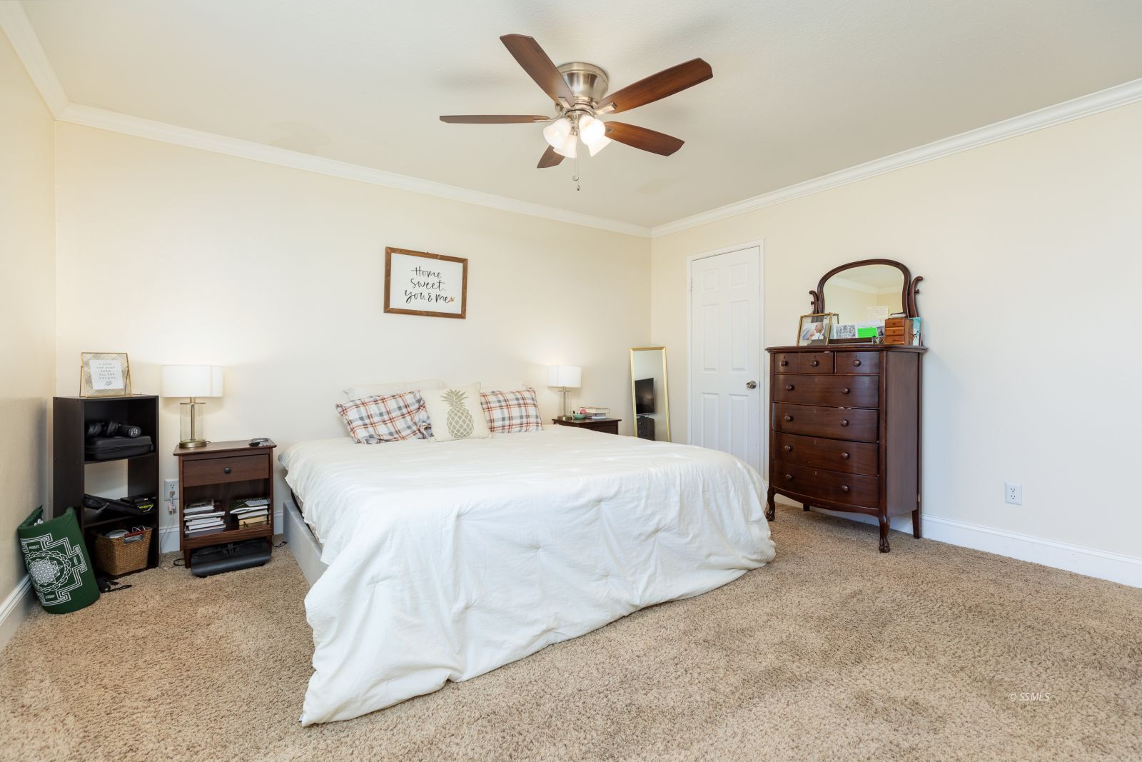 413 North Inyo Street Ridgecrest, CA 93555 - Photo 13 of 27 a bedroom with a bed and dresser