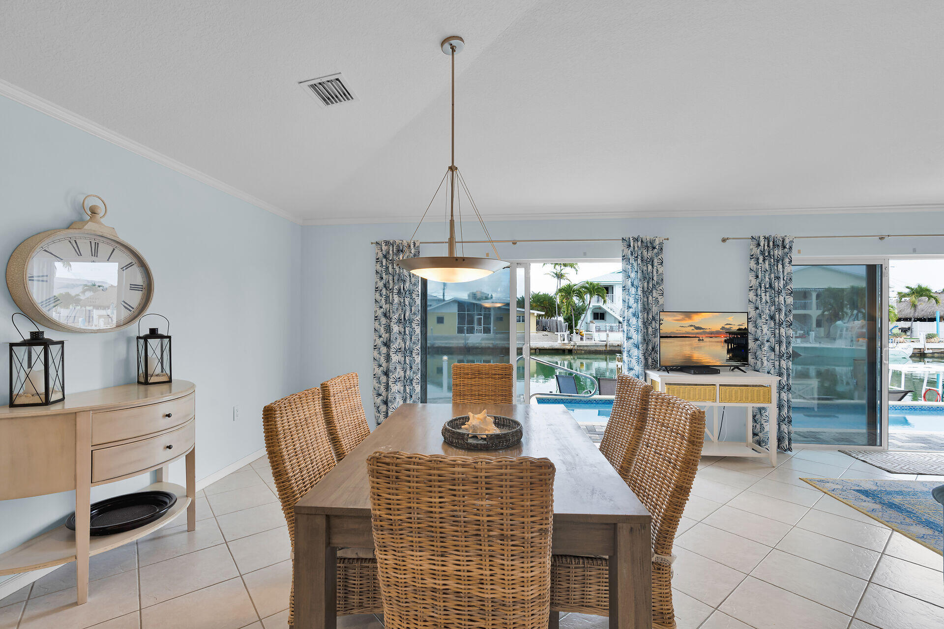 270 Sadowski Key Key Colony Beach, FL 33051 - Photo 7 of 46 a dining room with furniture a chandelier and wooden floor