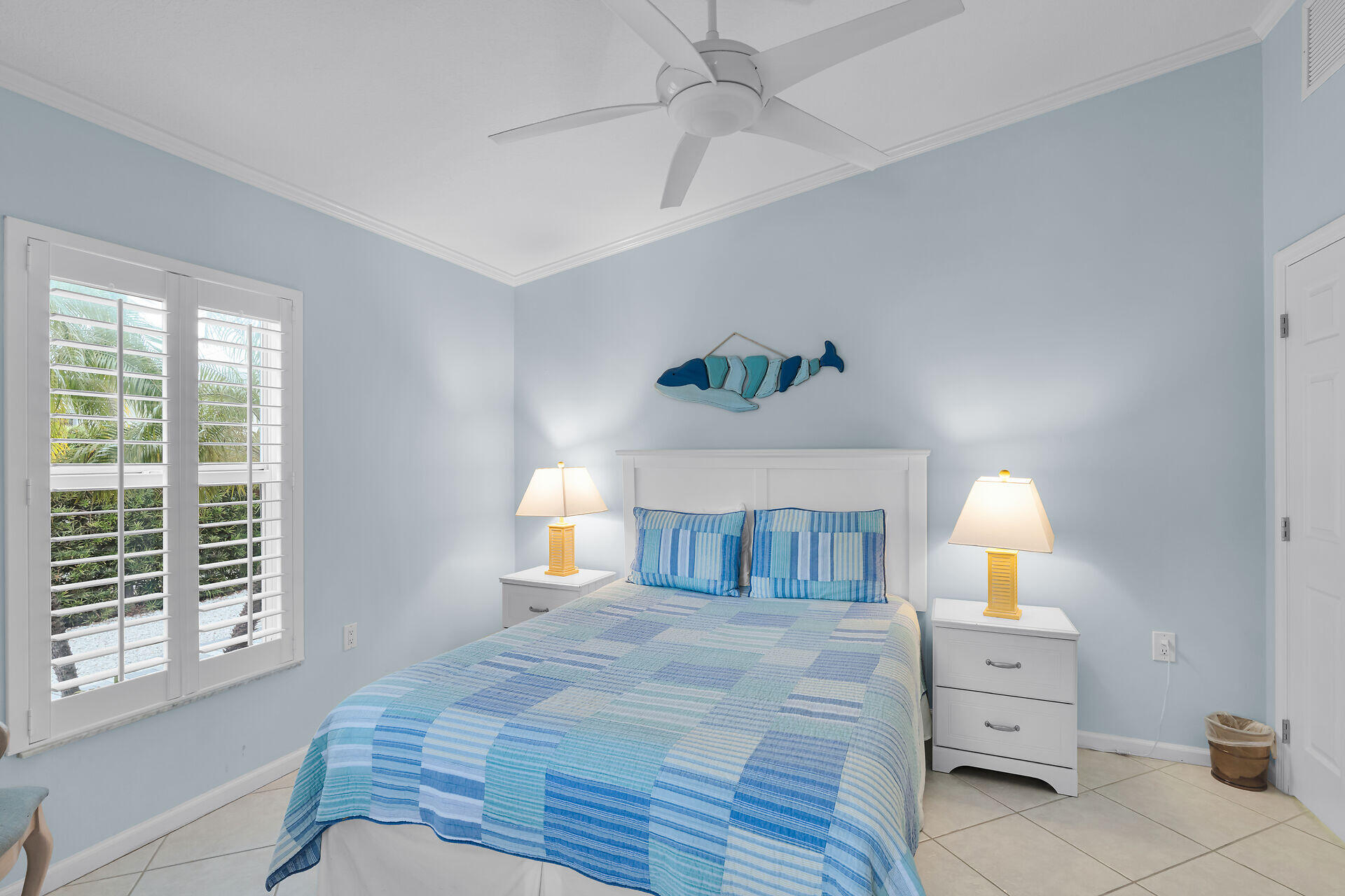 270 Sadowski Key Key Colony Beach, FL 33051 - Photo 13 of 46 a spacious bedroom with a bed and a chandelier