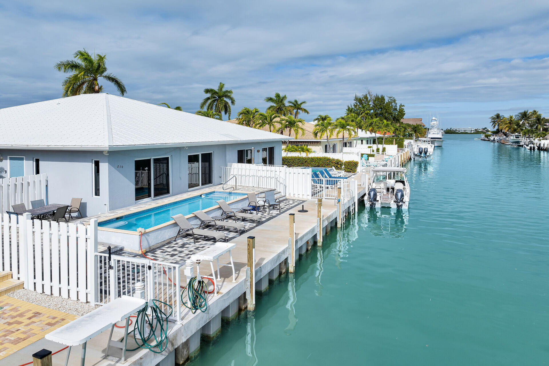 270 Sadowski Key Key Colony Beach, FL 33051 - Photo 2 of 46 a view of a house with a yard from a balcony