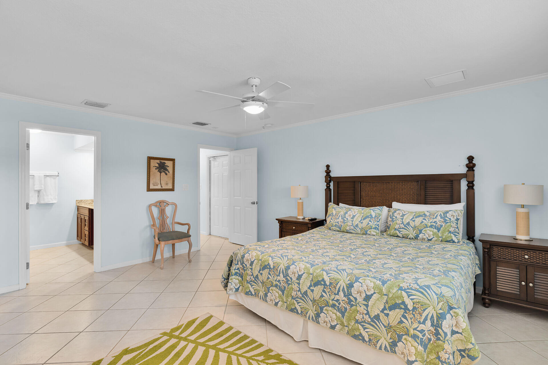 270 Sadowski Key Key Colony Beach, FL 33051 - Photo 25 of 46 a bedroom with a large bed and a lamp on table