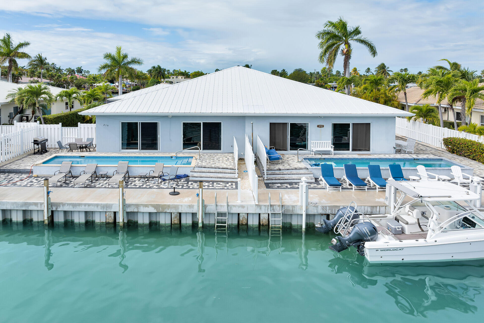 270 Sadowski Key Key Colony Beach, FL 33051 - Photo 3 of 46 a front view of house with yard and seating area