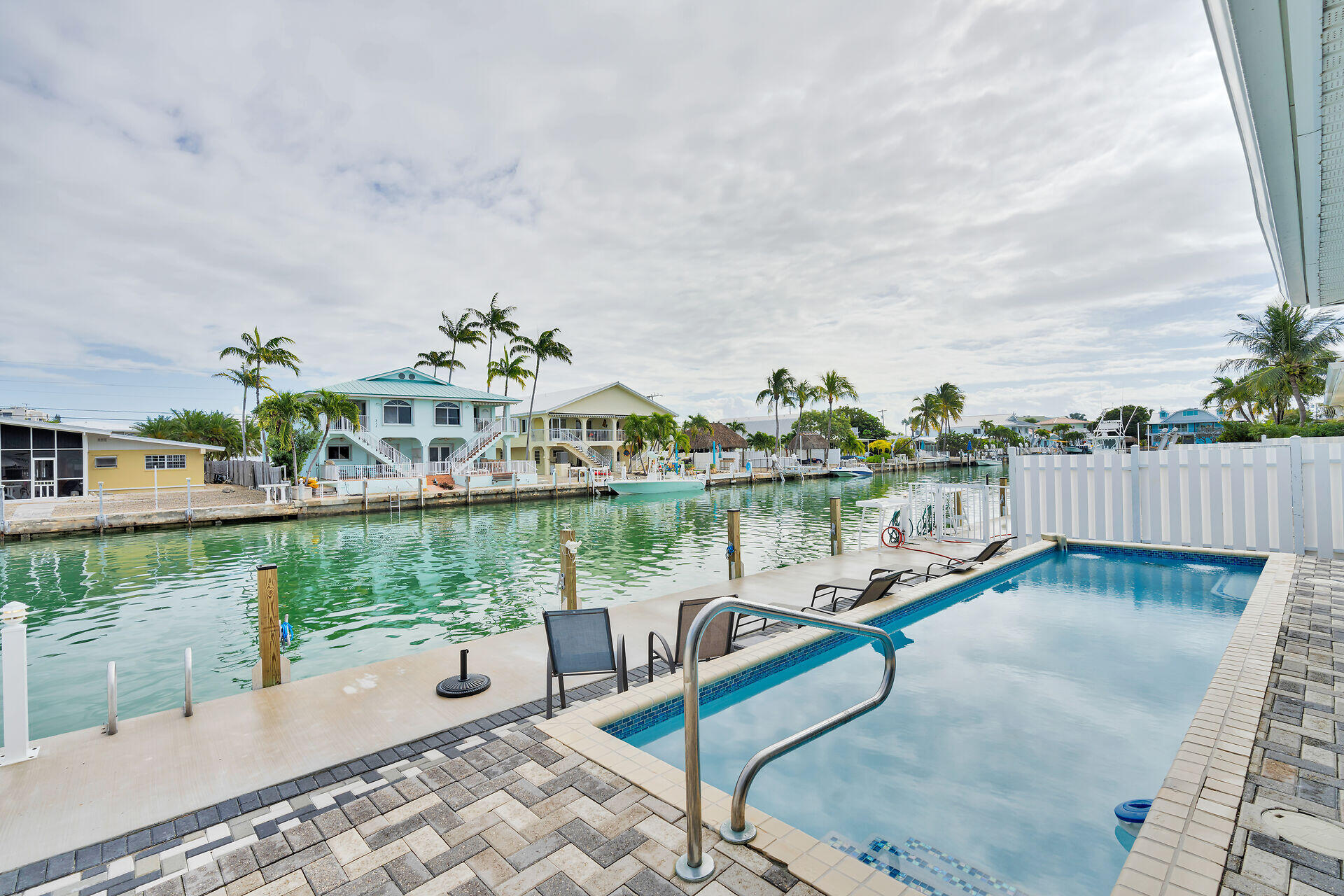 270 Sadowski Key Key Colony Beach, FL 33051 - Photo 31 of 46 a terrace with outdoor seating and lake view