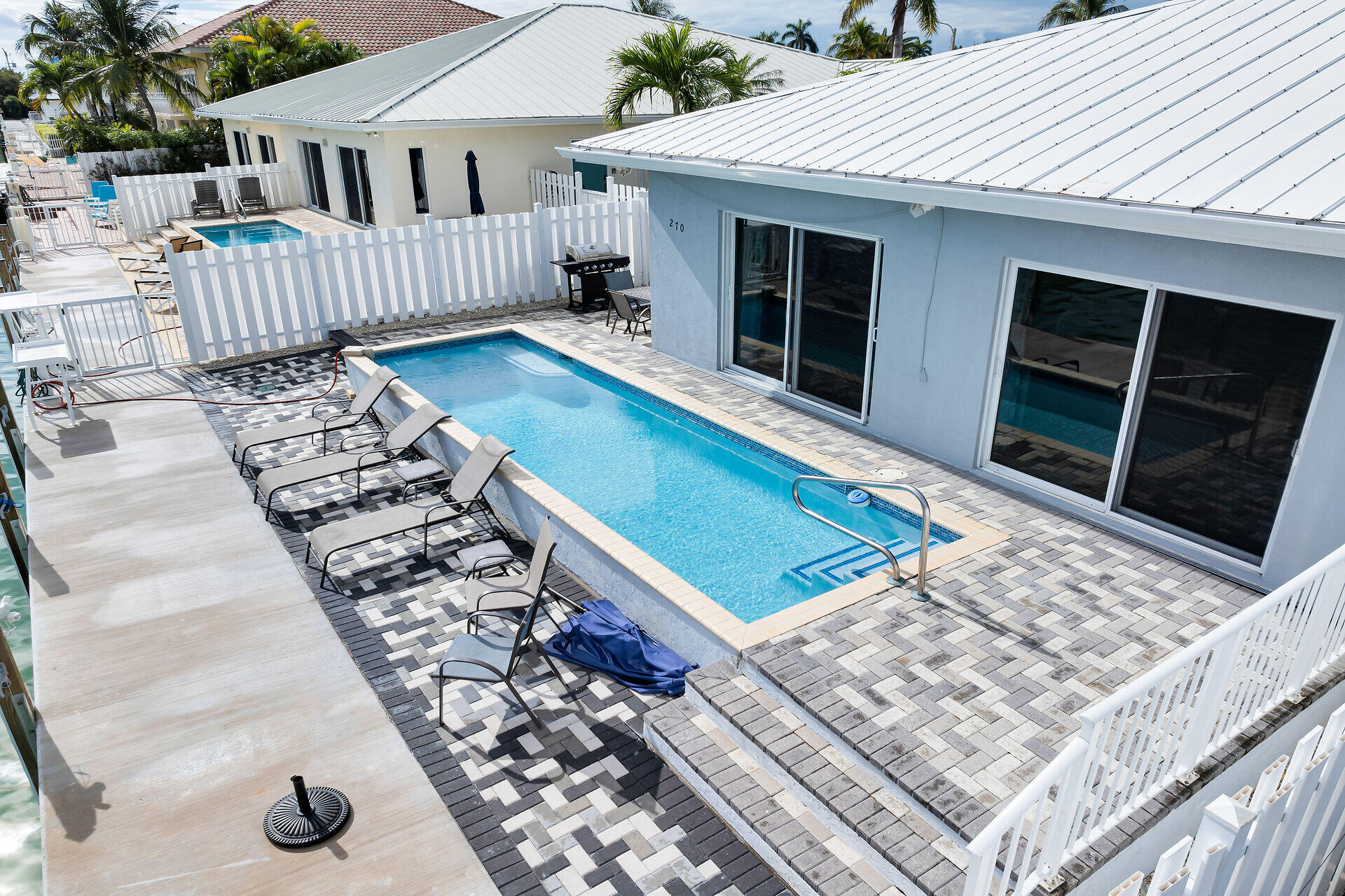 270 Sadowski Key Key Colony Beach, FL 33051 - Photo 32 of 46 a view of a balcony with chairs