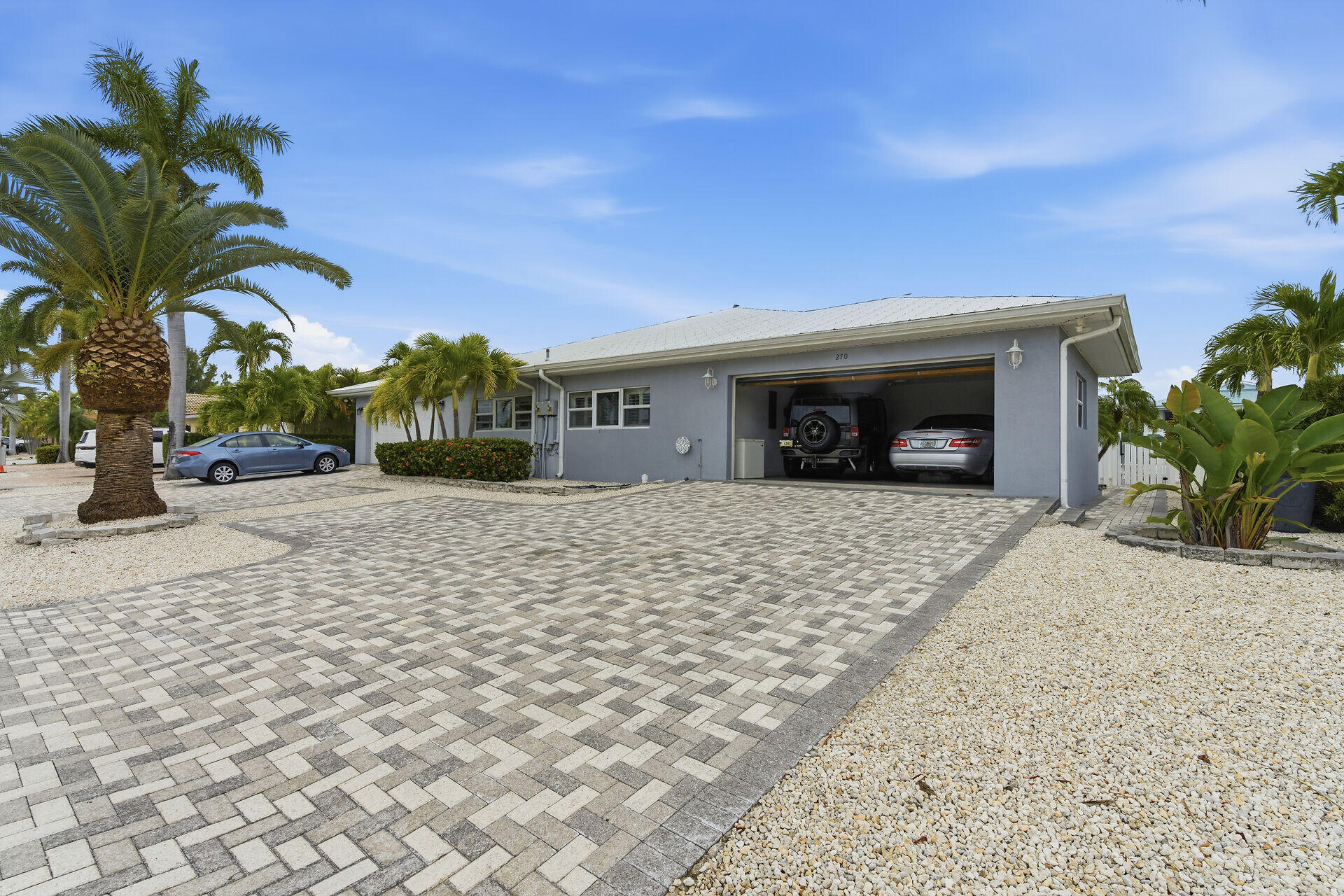270 Sadowski Key Key Colony Beach, FL 33051 - Photo 36 of 46 a front view of a house with a yard